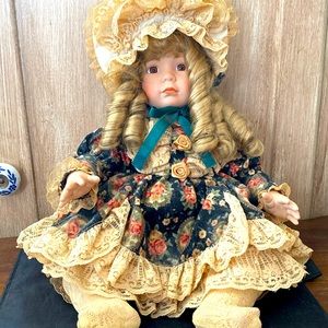 Lauren Elizabeth Porcelain Doll sitting, vintage/antique